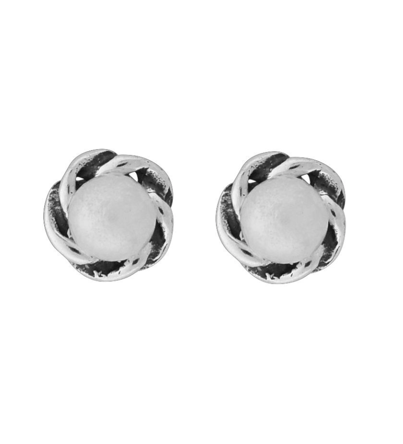 A pair of Wheeler sterling silver earrings featuring round pearl designs with a twisted silver band. Available at Be Charmed