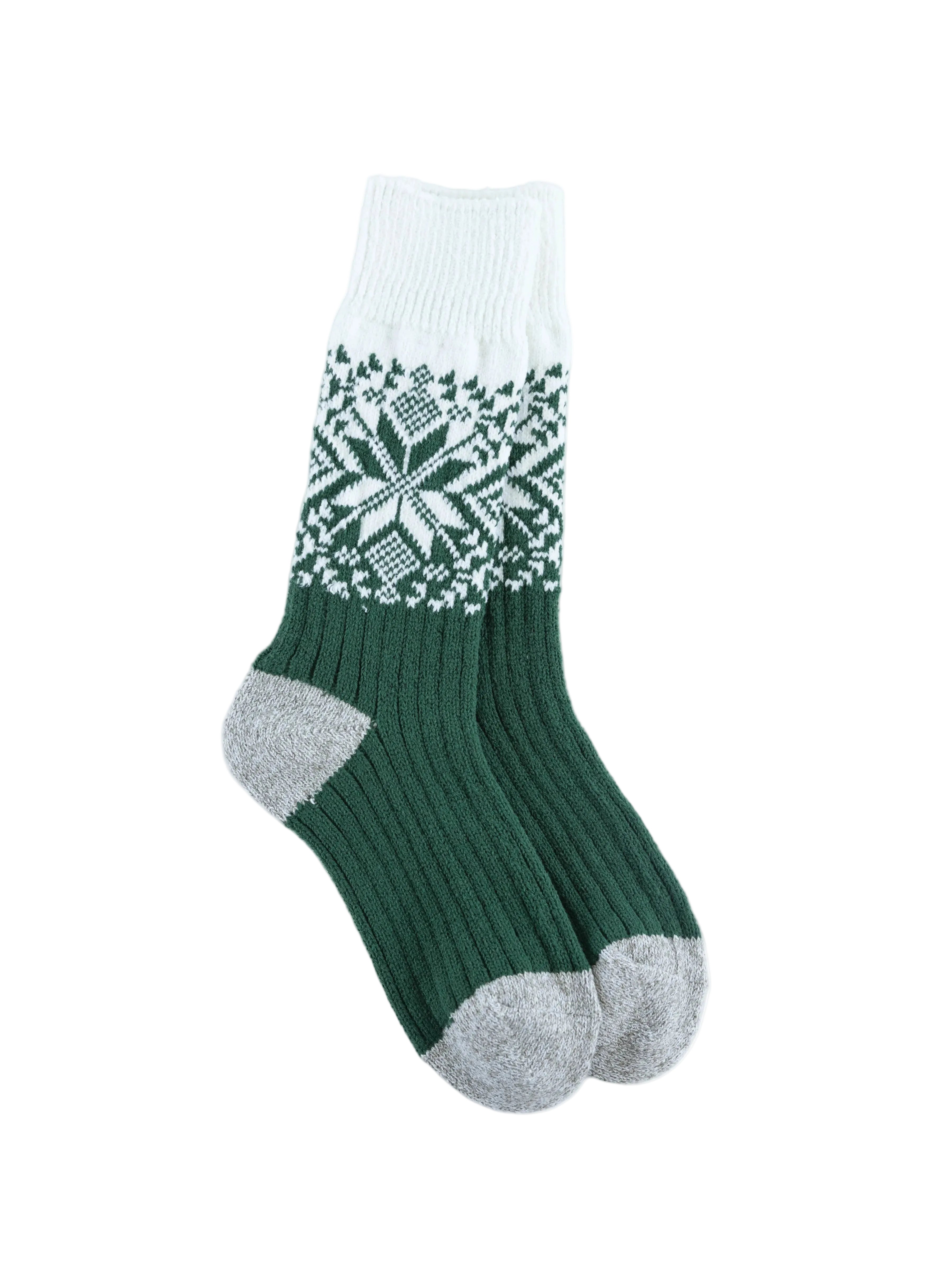 Green and white patterned World's Softest  Holiday crew sock on a white background. Available at Be Charmed