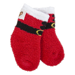 A pair of WOrld's Softest Socks red plush fleece socks with a white fuzzy cuff, a black horizontal stripe, and small yellow accents, shown on a plain white background. Available at Be Charmed