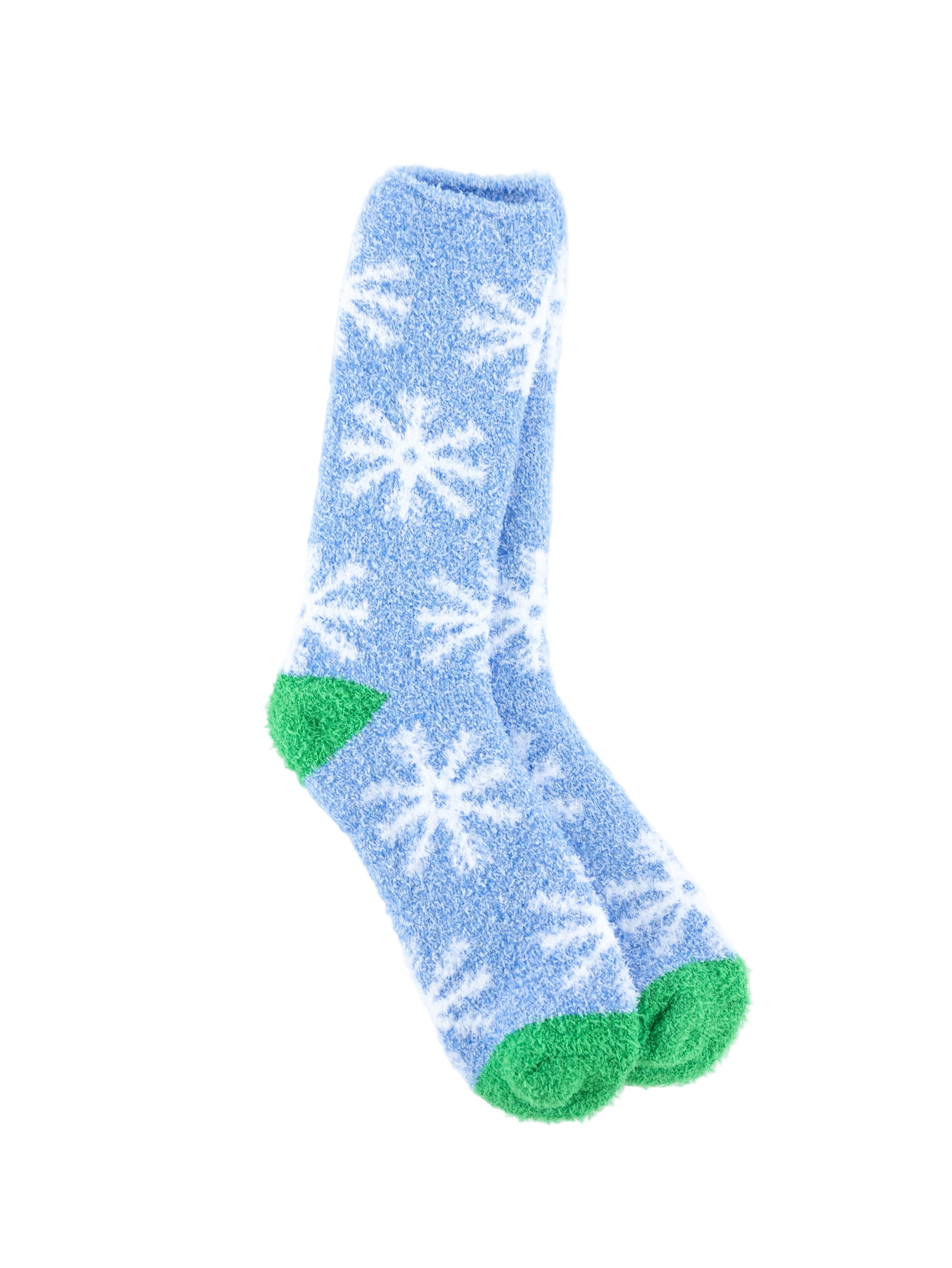 World's Softest blue socks with white snowflake patterns and green toes on awhite  background. Available at Be Charmed