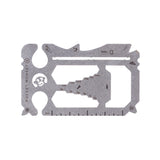 A stainless steel multi-tool with various wrench sizes and a pry bar, labeled with the Zootility brand and 'PocketMonkey X' designation. Available at Be Charmed