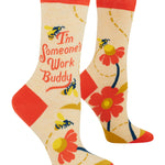 Colorful socks with floral designs and text on a white background. Available at Be Charmed