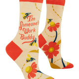 Colorful socks with floral designs and text on a white background. Available at Be Charmed