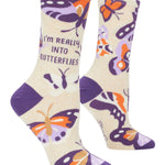 Blue Q Really Into Butterflies crew socks featuring a colorful butterfly graphic design, available at Be Charmed