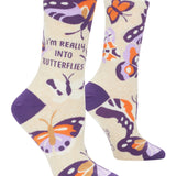 Blue Q Really Into Butterflies crew socks featuring a colorful butterfly graphic design, available at Be Charmed