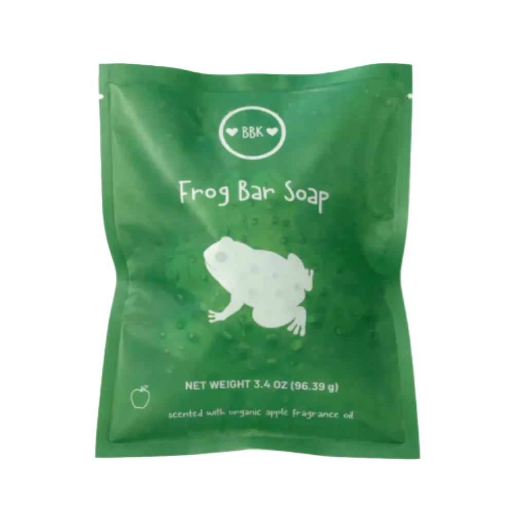 Green packaging of Frog Bar Soap with a white frog illustration and BBK branding. Available at Be Charmed