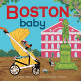 Book cover of 'Boston Baby' with a baby in a stroller, a building, and a statue. Available at Be Charmed
