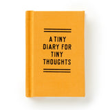 Brass Monkey Tiny Diary, extra-small hardcover journal with a foil-stamped Tiny Thoughts felt cover, available at Be Charmed