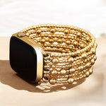 Cape Diablo Golden Demure Stretch Apple Watch Band – elegant gold-tone stretch band for Apple Watch. Available at Be Charmed.