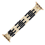 Beaded watch band with black and beige beads on a white background