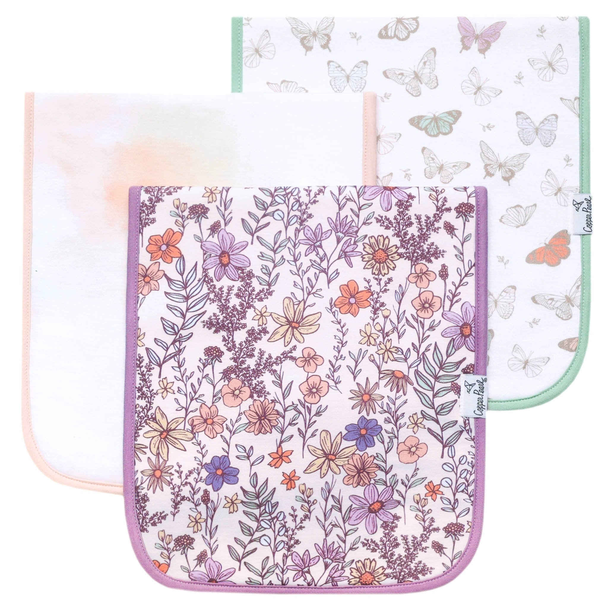 Three baby burp cloths with floral and butterfly patterns on a white background. Available at Be Charmed