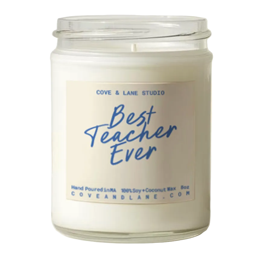 Candle jar labeled 'Best Teacher Ever' by Cove & Lane Studio on a white surface. Available at Be Charmed