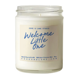 Cove & Lane Welcome Little One scented nursery candle and baby shower gift, available at Be Charmed.