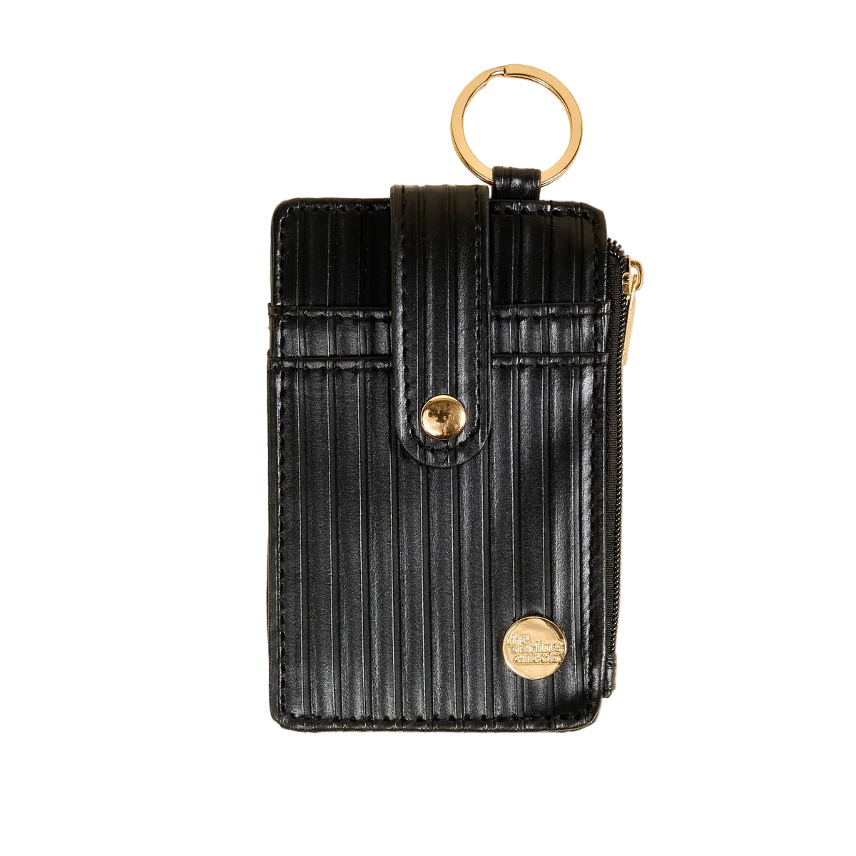 Black textured keychain wallet with gold accents on a beige background. Available at Be Charmed