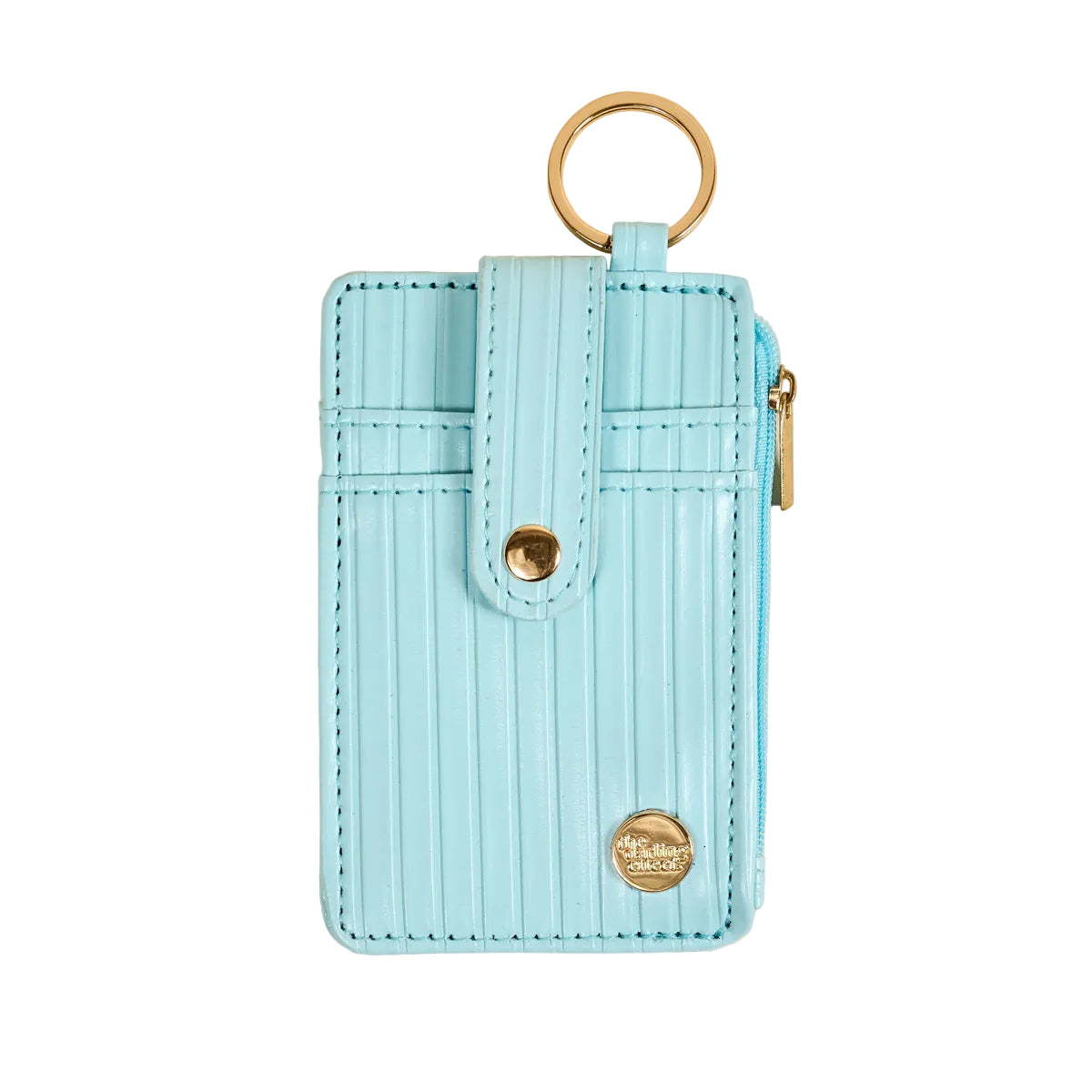 Light blue cardholder with gold accents on a beige background. Available at Be Charmed