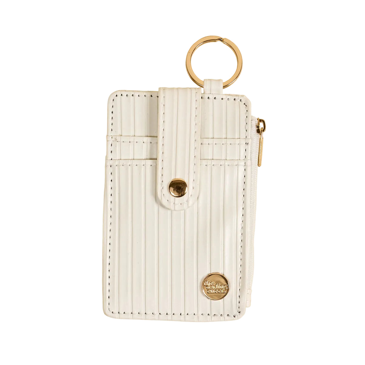 White cardholder with gold accents on a beige background. Available at Be Charmed