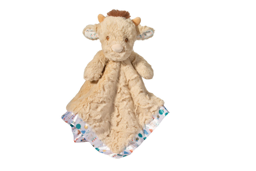 Plush snuggler with a cow design on a white background. Available at Be Charmed