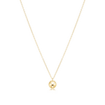 Gold necklace with a round pendant on a white background. Available at Be Charmed