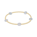 enewton Admire Small Gem 2mm Gold Bracelet with gold-filled beads and delicate aquamarine gemstone accent, stackable stretch bracelet Available at Be Charmed