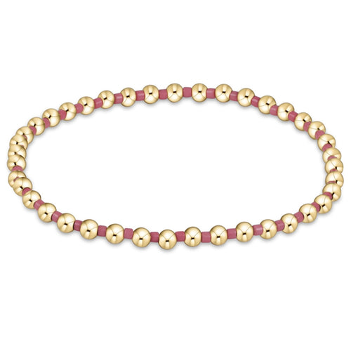 enewton Hope Grateful bracelet with bright pink beads in a symbolic pattern of gratitude; bold, stretch-fit, and stackable. Available at Be Charmed.