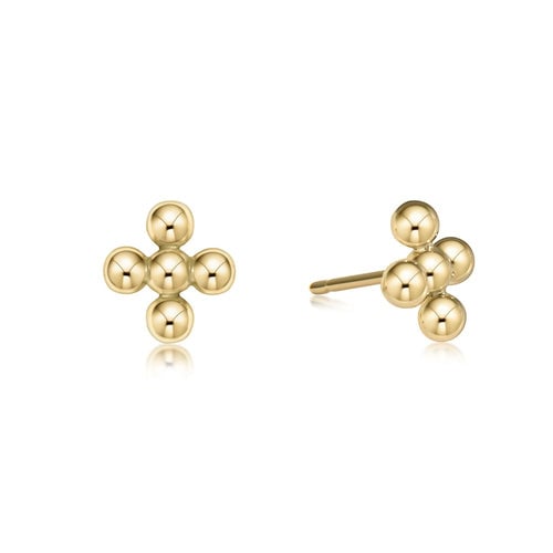 A pair of gold-filled stud earrings designed in the shape of a beaded cross. Available at Be Charmed