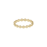 Gold ring with beaded design on a white background. Available at Be Charmed