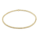 enewton Classic Gold 2mm Bead Bracelet made with 14k gold-filled beads. Minimalist, stackable, and water-friendly. Available at Be Charmed.