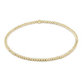 enewton Classic Gold 2mm Bead Bracelet made with 14k gold-filled beads. Minimalist, stackable, and water-friendly. Available at Be Charmed.
