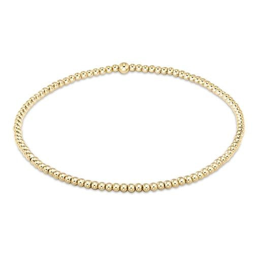 enewton Classic Gold 2mm Bead Bracelet made with 14k gold-filled beads. Minimalist, stackable, and water-friendly. Available at Be Charmed.