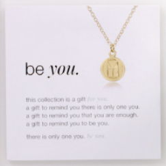 enewton Classic Gold 2.5mm Bead Bracelet on card featuring stretch design with “Be You” small gold disc charm. Minimalist, elegant style. Available at Be Charmed.