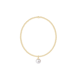 Gold bracelet with a single pearl charm on a white background. Available at Be Charmed