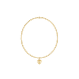 Gold bracelet with a heart-shaped charm on a white background. Available at Be Charmed