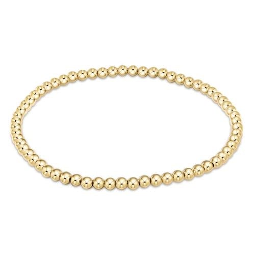 enewton Classic Gold 3mm Bead Bracelet crafted with 14k gold-filled beads. Stackable, water-friendly, and perfect for daily wear. Available at Be Charmed.