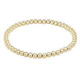 enewton Classic Gold 4mm Bead Bracelet with 4mm gold-filled beads, stackable stretch bracelet for everyday wear Available at Be Charmed