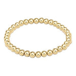 enewton Classic Gold 5mm Bead Bracelet with polished 14k gold-filled beads. Timeless, water-friendly, and stackable. Available at Be Charmed.