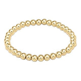enewton Classic Gold 5mm Bead Bracelet with polished 14k gold-filled beads. Timeless, water-friendly, and stackable. Available at Be Charmed.