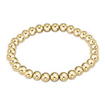 enewton Classic 6mm gold-filled bead bracelet with bold design, perfect for stacking or wearing solo. Durable and water-friendly. Available at Be Charmed.