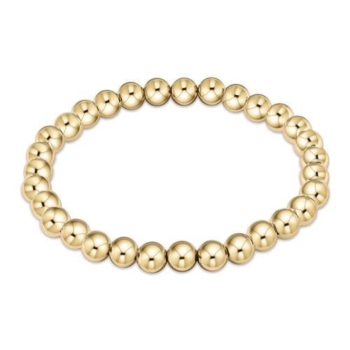 enewton Classic 6mm gold-filled bead bracelet with bold design, perfect for stacking or wearing solo. Durable and water-friendly. Available at Be Charmed.
