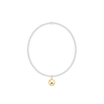 Bracelet with a gold charm on a white background. Be Charmed