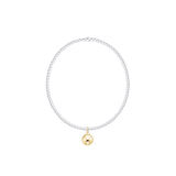 Bracelet with a gold charm on a white background. Be Charmed