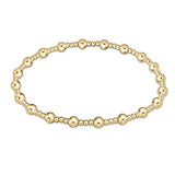 Classic Sincerity Pattern 4mm Bead Bracelet by enewton featuring polished gold-filled beads on a stretch cord—elegant and stackable; available at Be Charmed