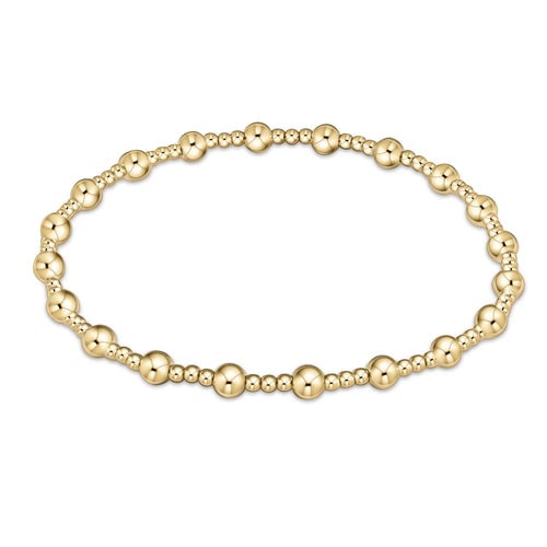 Classic Sincerity Pattern 4mm Bead Bracelet by enewton featuring polished gold-filled beads on a stretch cord—elegant and stackable; available at Be Charmed