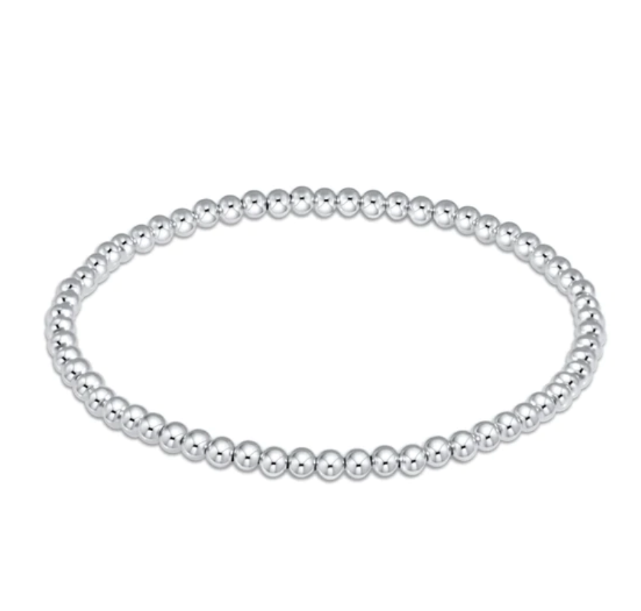 enewton Classic Sterling 3 mm Bead Bracelet made with sterling silver‑filled beads on high‑performance stretch cord for everyday wear and stacking. Lightweight, tarnish‑resistant design. Available at Be Charmed.