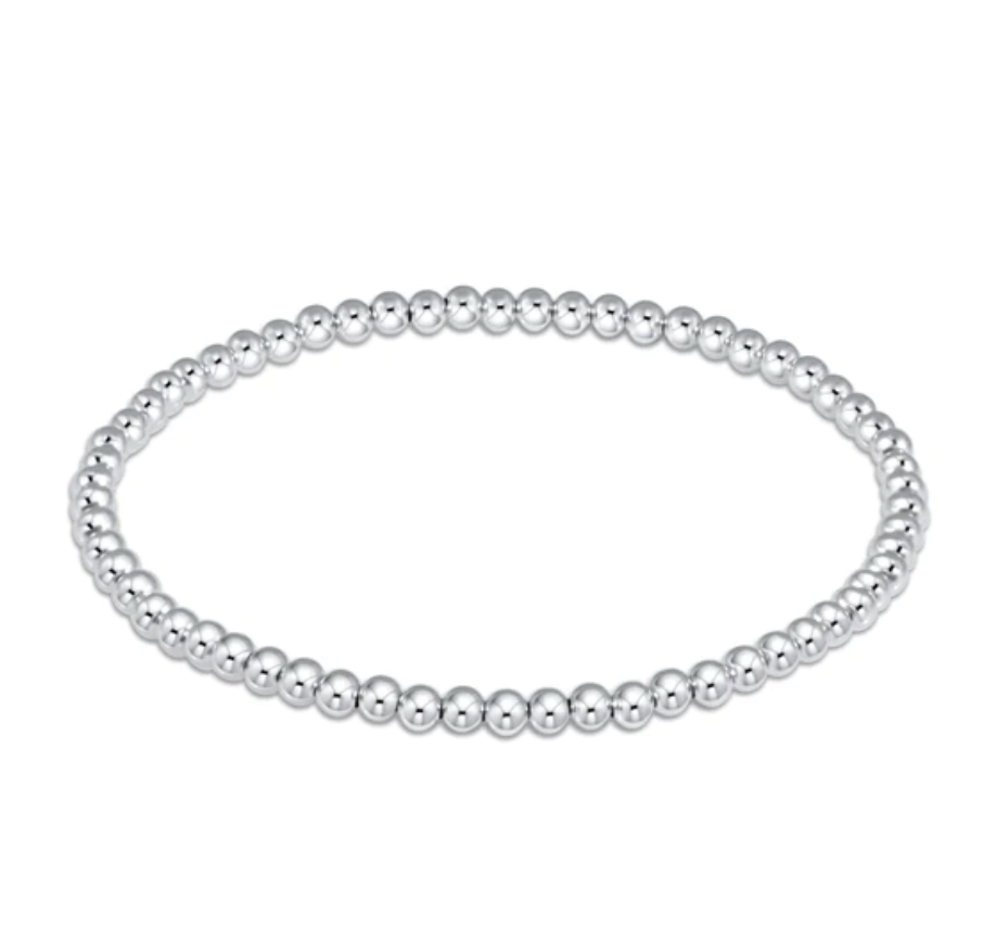 enewton Classic Sterling 3 mm Bead Bracelet made with sterling silver‑filled beads on high‑performance stretch cord for everyday wear and stacking. Lightweight, tarnish‑resistant design. Available at Be Charmed.