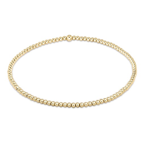 enewton Extends Classic 2mm gold-filled bead bracelet with a relaxed fit, ideal for everyday wear and stacking. Water-friendly. Available at Be Charmed.