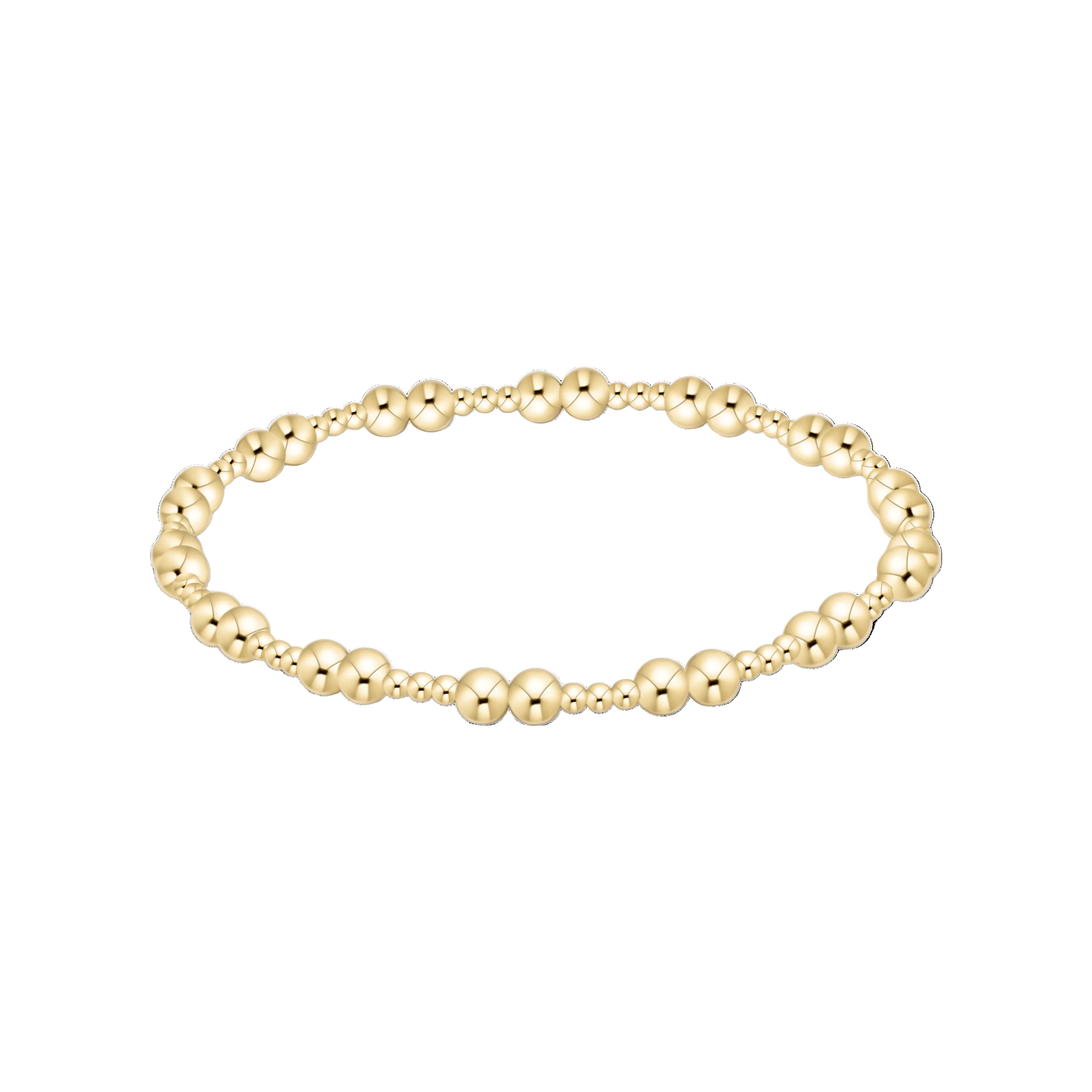Gold beaded bracelet on a white background. Available at Be Charmed