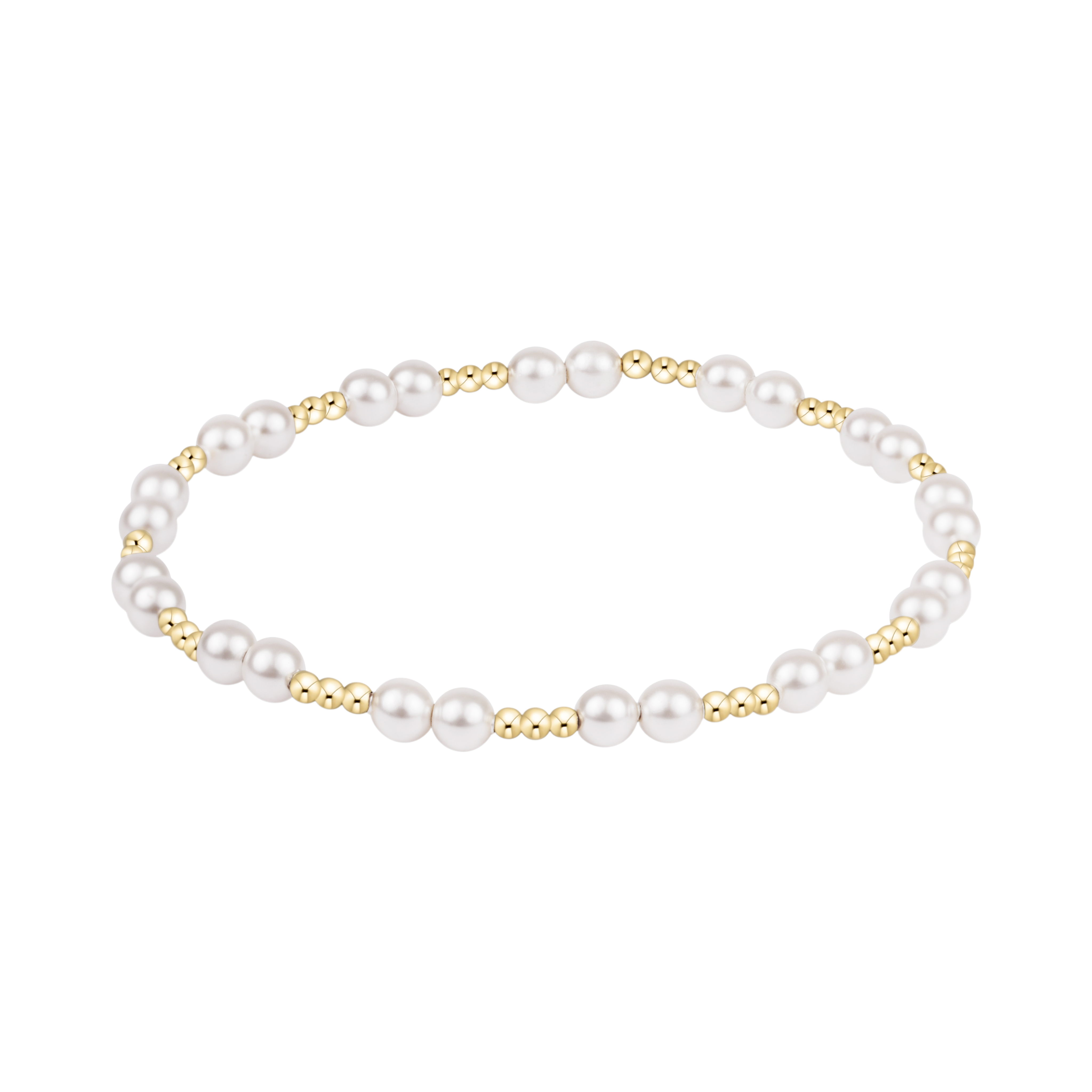 Pearl bracelet with gold accents on a white background. Available at Be Charmed