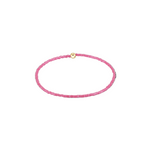 Pink beaded bracelet with a gold clasp on a white background. Available at Be Charmed
