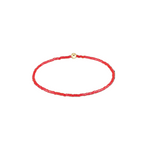 Red beaded bracelet with a gold clasp on a white background. Available at Be Charmed