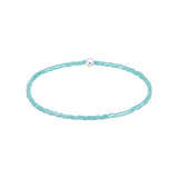 Turquoise beaded choker necklace on a white background. Available at Be Charmed